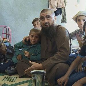 Foto De padres e hijos