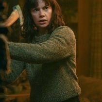 Foto La mujer en la pared