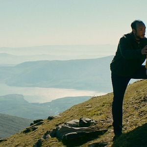 Foto Behind the Mountains