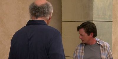 Cartel de Larry vs. Michael J. Fox