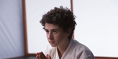 Cartel de Stanley and the Tattoo of Tall Tales