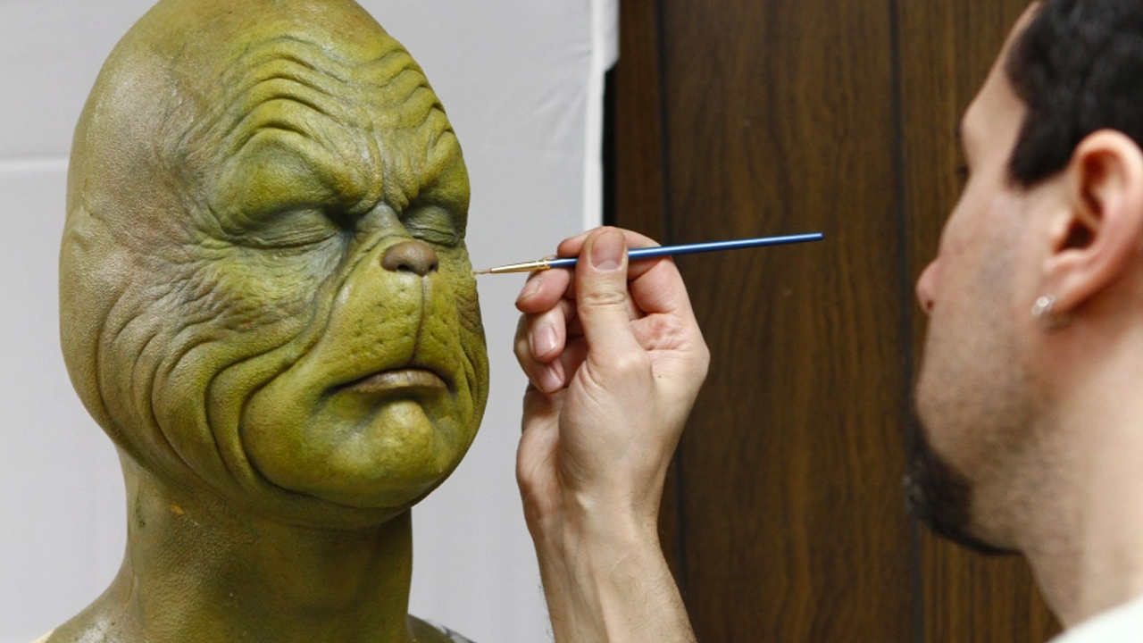 El maquillaje incluía capaz de latex para poder mantener las expresiones faciales.