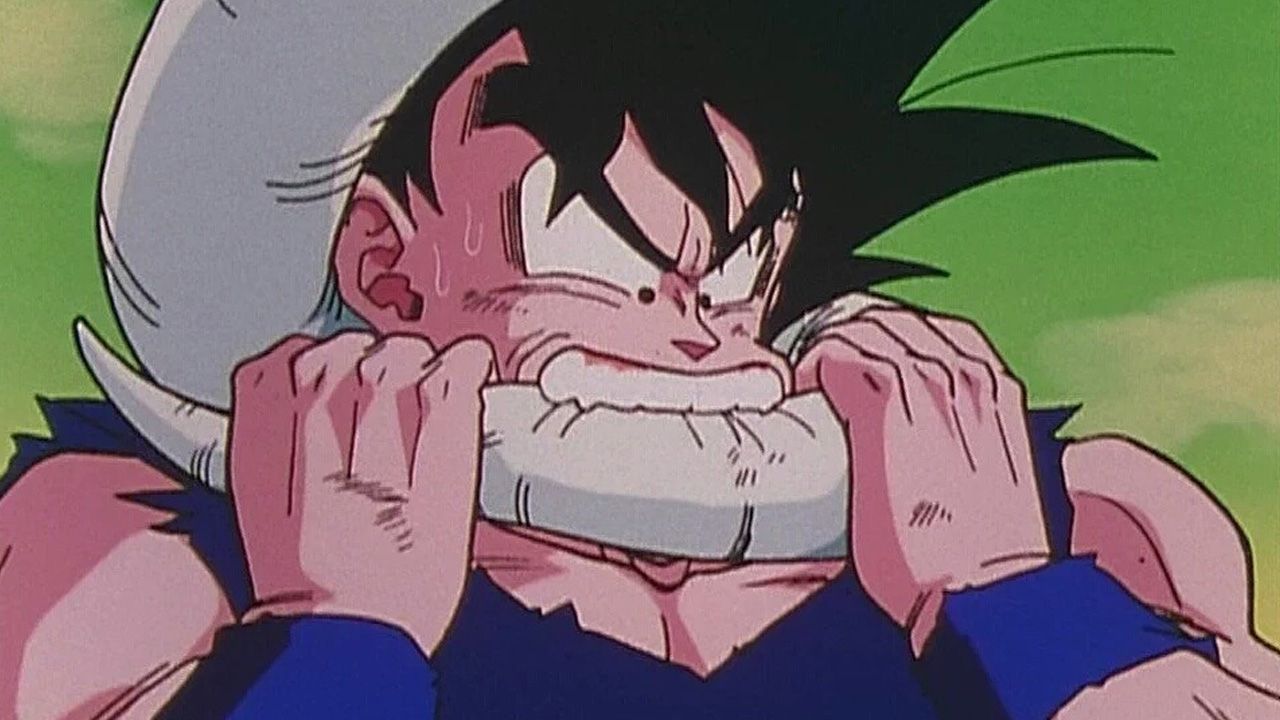Goku mordiendo a Freezer.