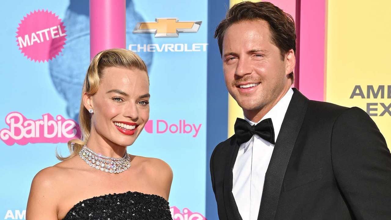 Margot Robbie y Tom Ackerley.