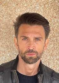 Póster Andrea Scarduzio